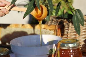 A honey spoon covered in honey